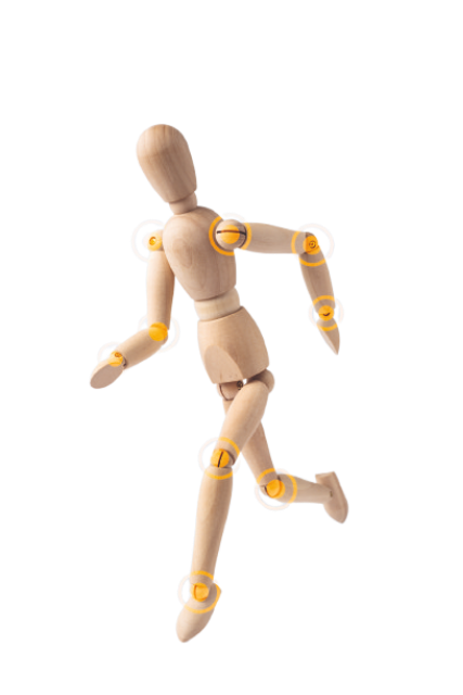 Una figura di manichino articolato in legno in posa di corsa su sfondo bianco.