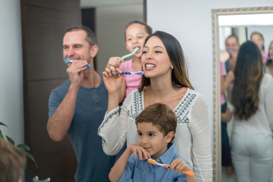 Family Brushing Teeth — Tucson, AZ — Brian J. Wong DDS & Viveca J. Valeriano DDS