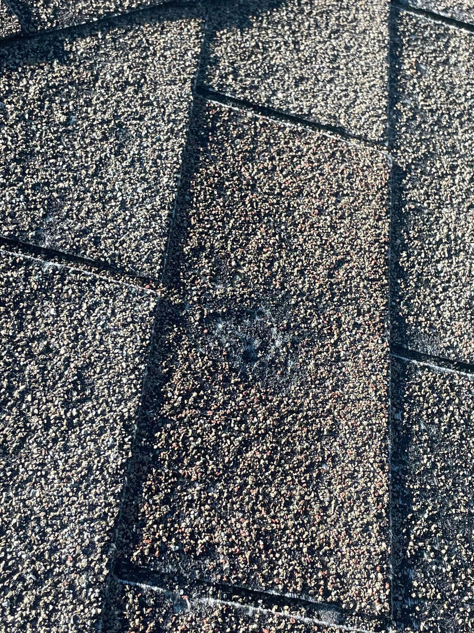 a close up of a roof with a hole in it .