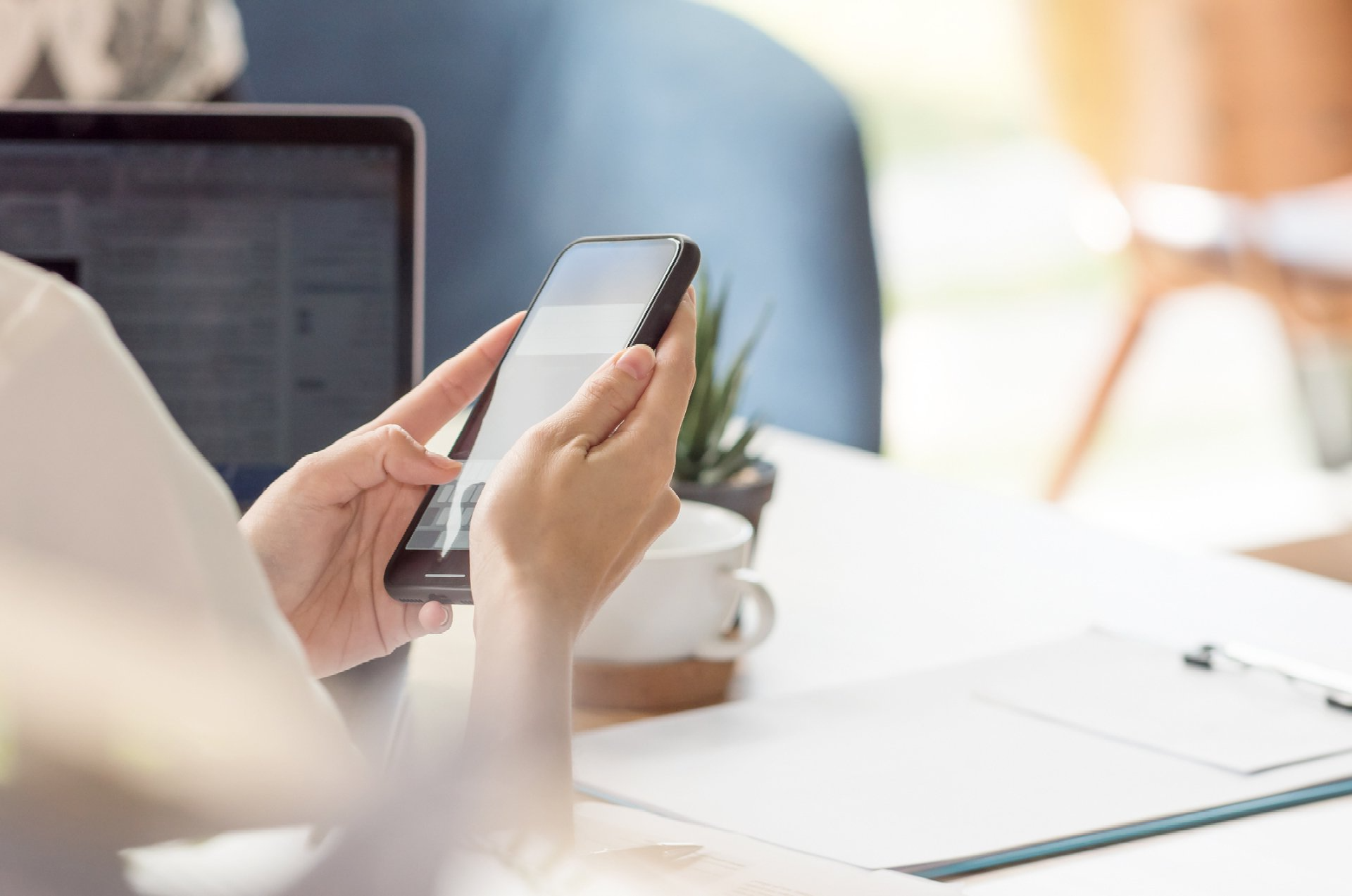 photo of a hands holding a phone