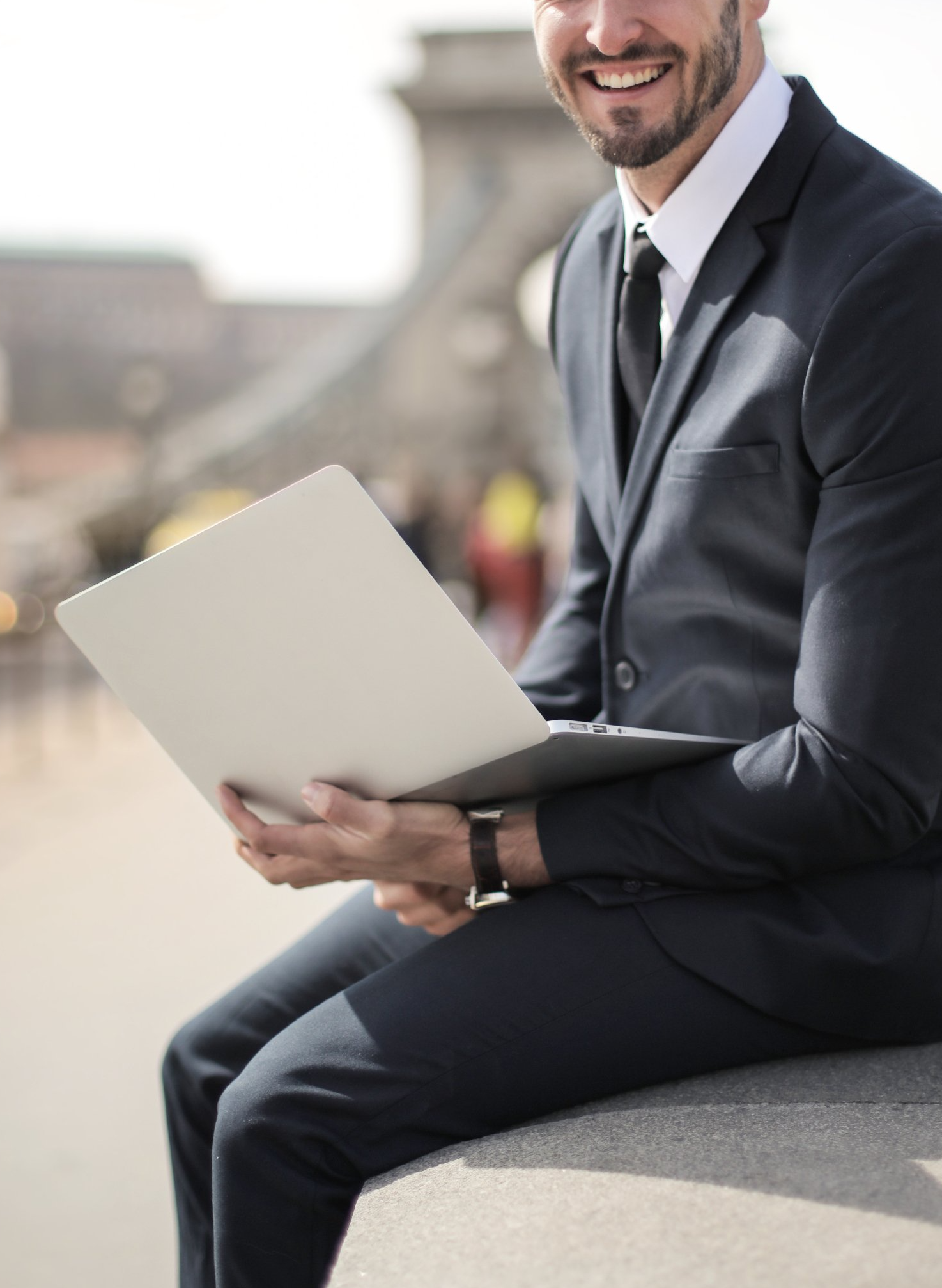 photo of a business person using a laptop