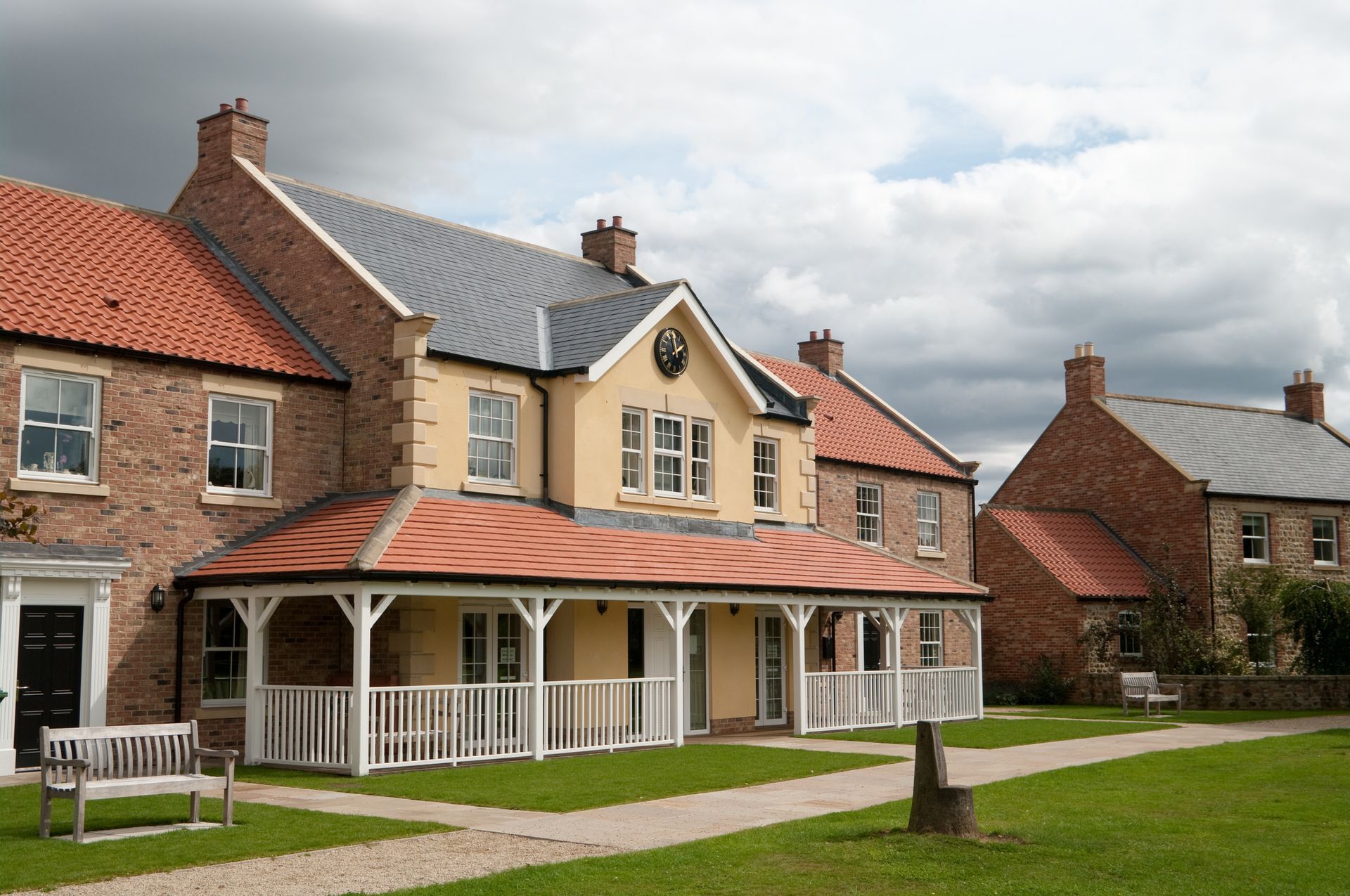 Charming Boutique Retirement Villages with traditional architecture and manicured lawns