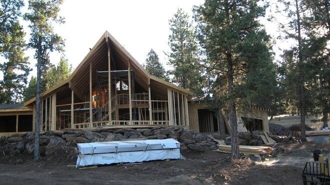 A house is being built in the middle of a fores