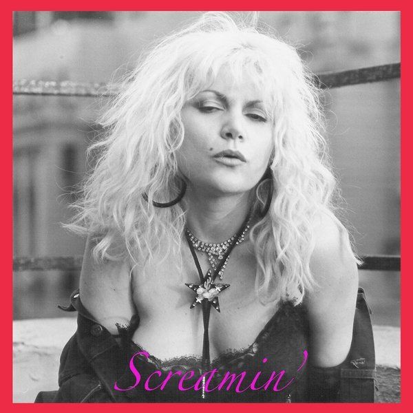 A black and white photo of a woman with the word screamin on the bottom