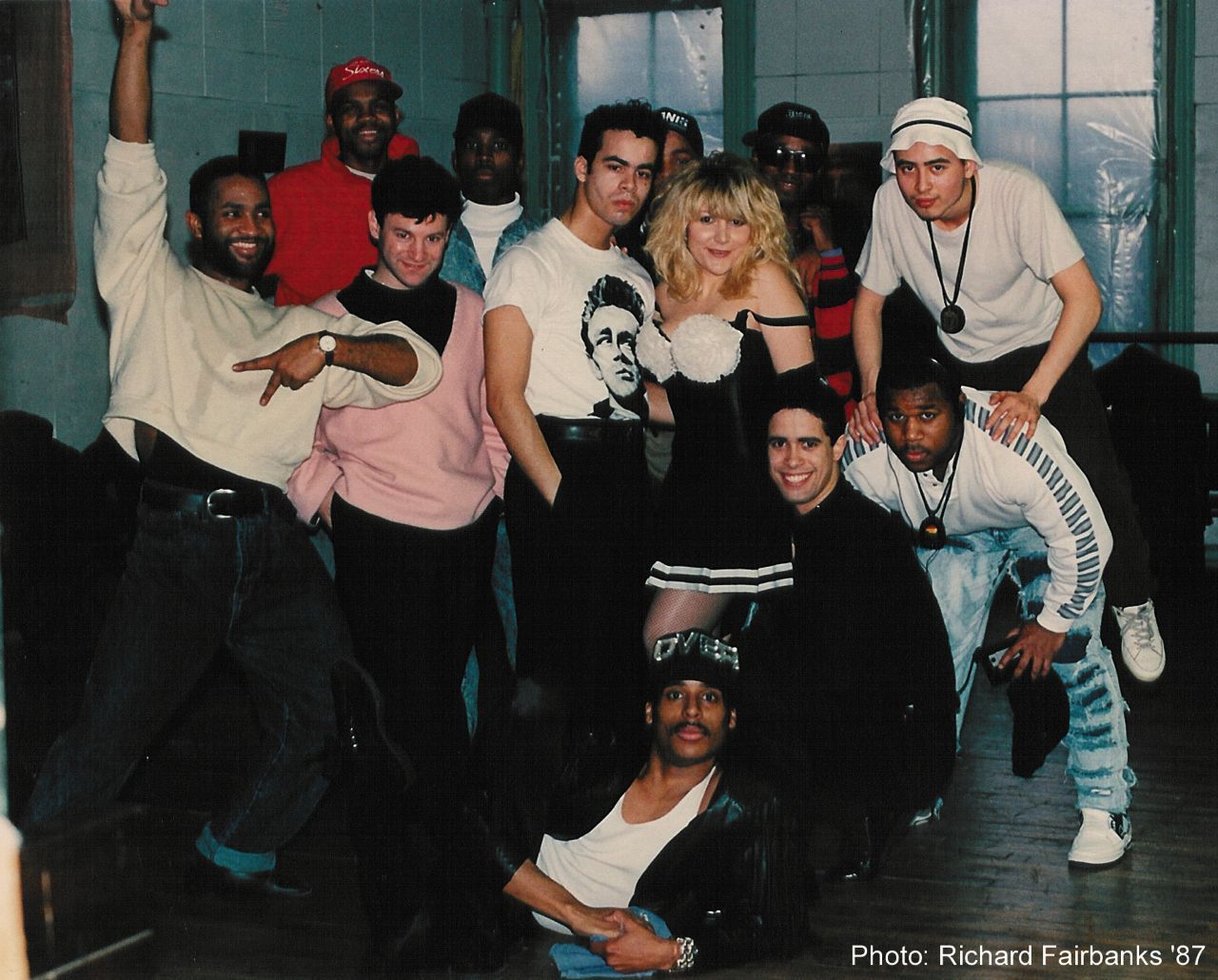 A group of people posing for a photo with the words photo richard farbank on the bottom