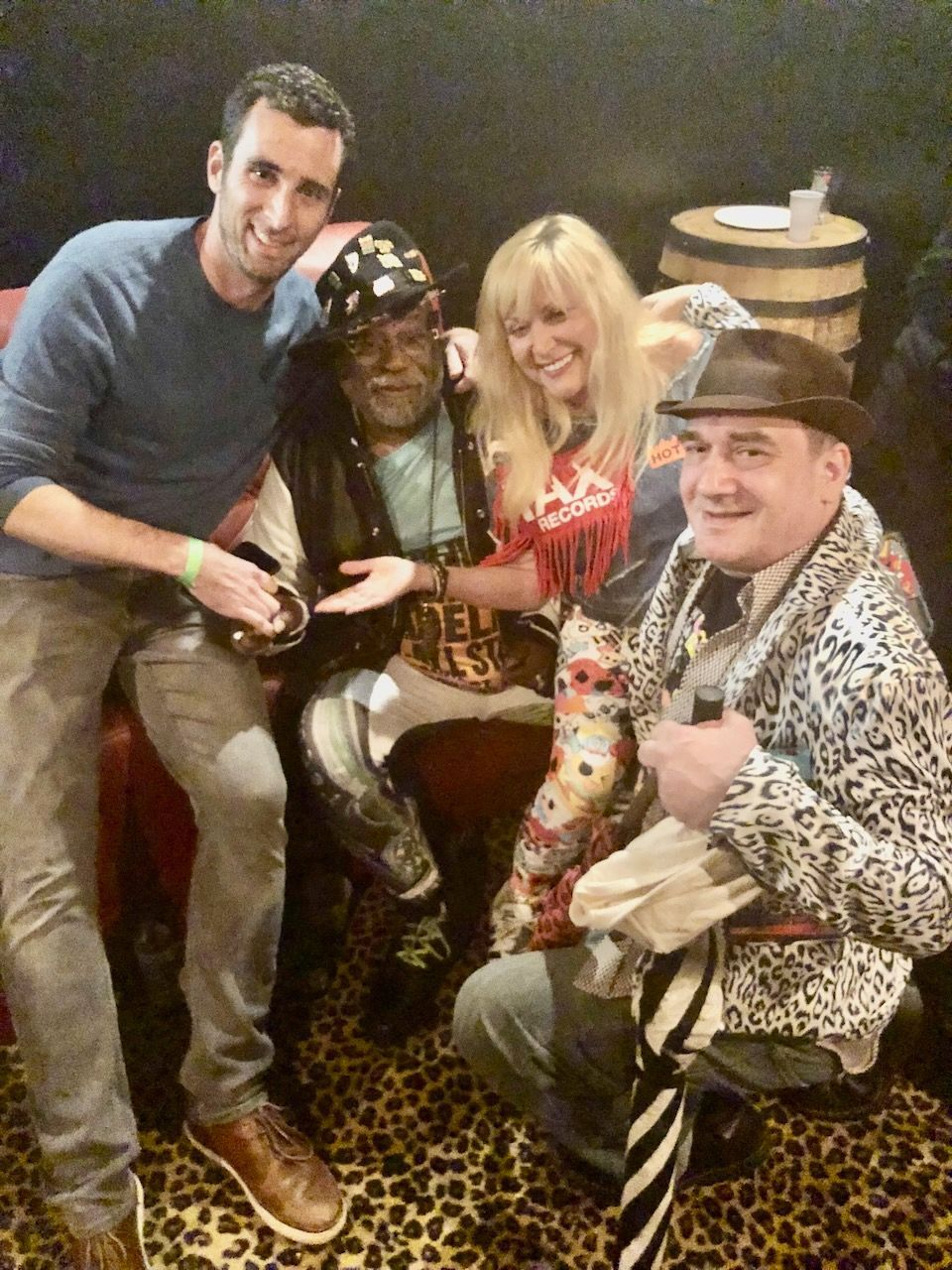 A group of people are posing for a picture together.