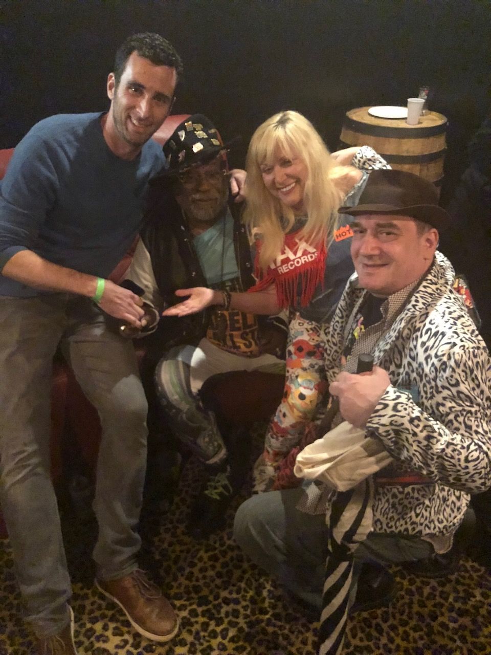 A group of people are posing for a picture together.