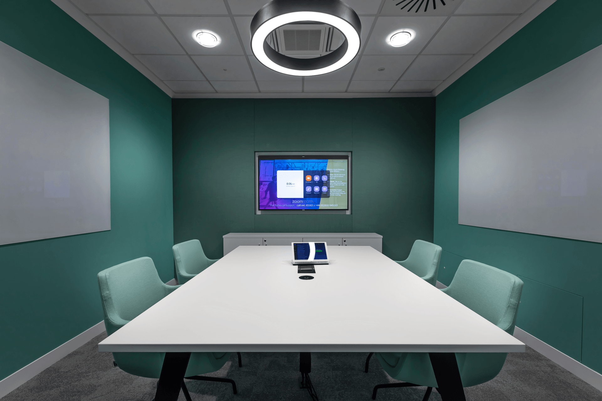 Teal conference room with circadian lighting