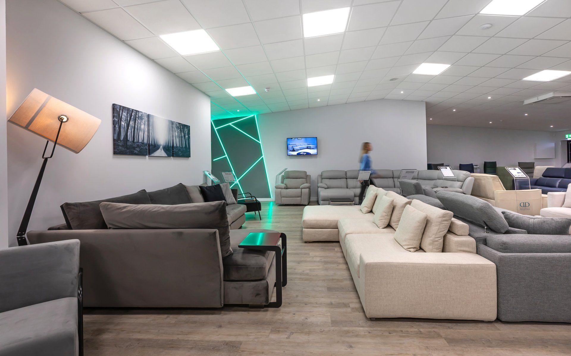A living room filled with lots of couches and chairs.
