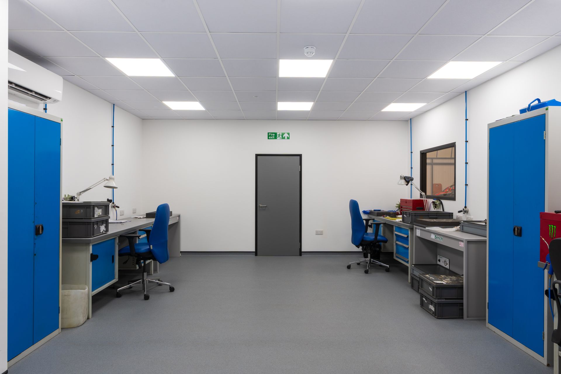 A bedroom with a bed , nightstands , and a window. Specialist nursing care beds