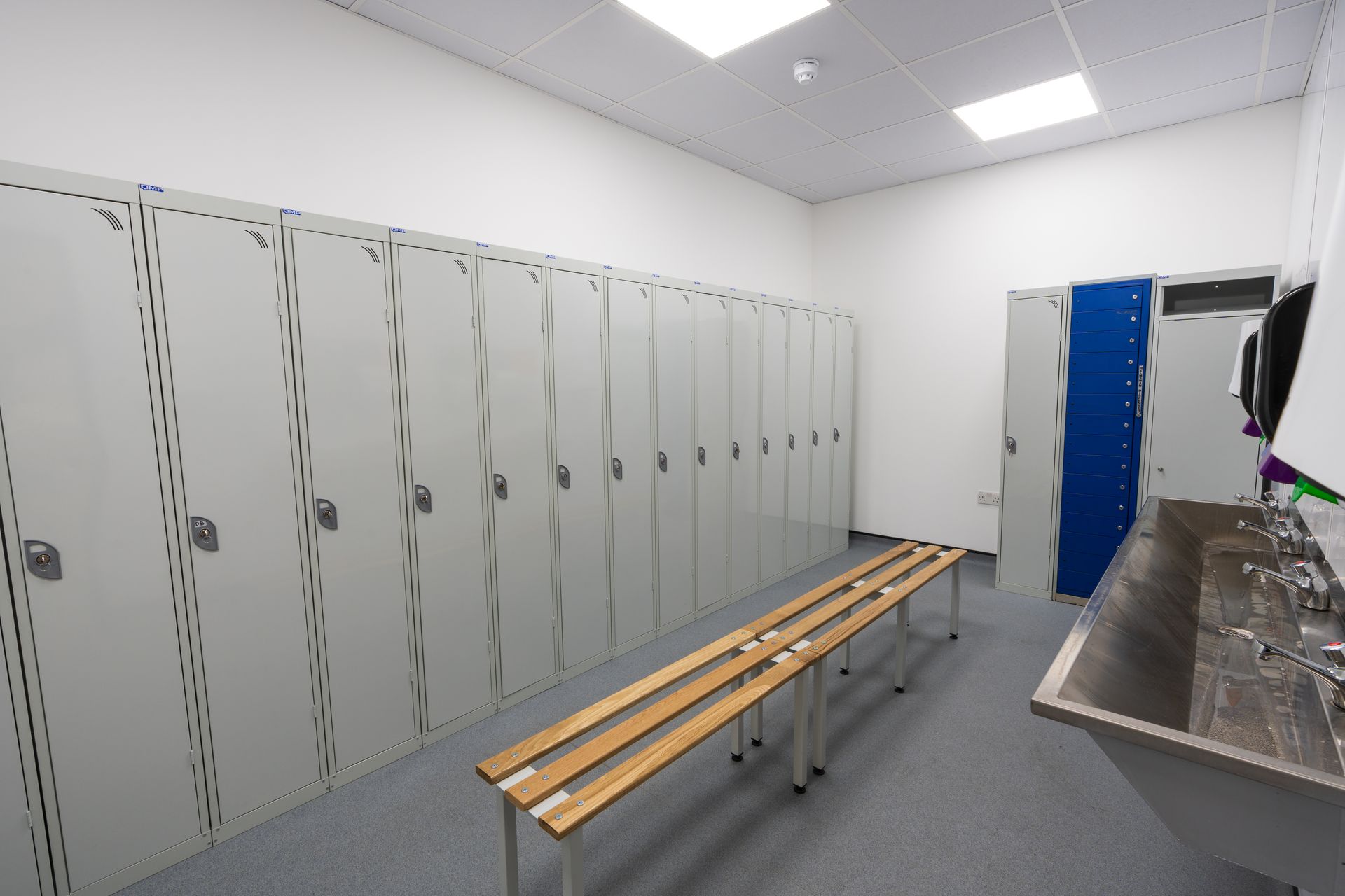 A large wooden building with the word opera on it. Specialist nursing care beds