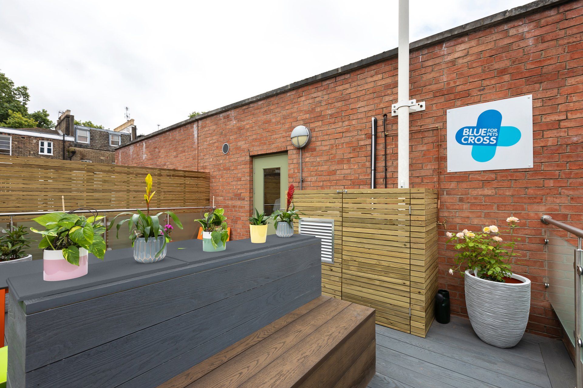 a brick building with a sign that says blue cross on it