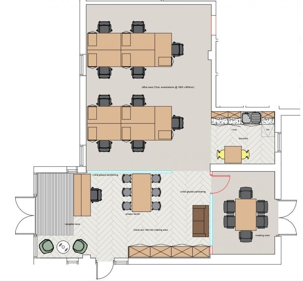 A floor plan of a room with tables and chairs