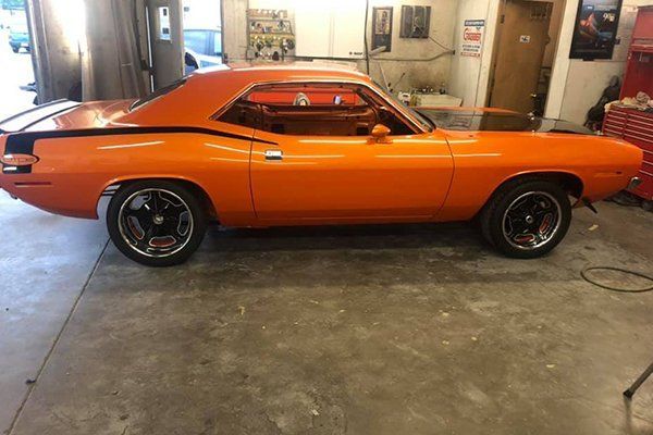 Orange Sports Car — Missoula, MT — House of Colors