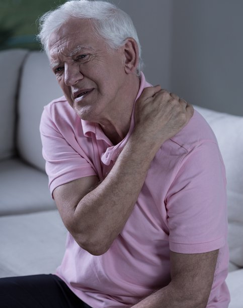 Elderly man with neck pain