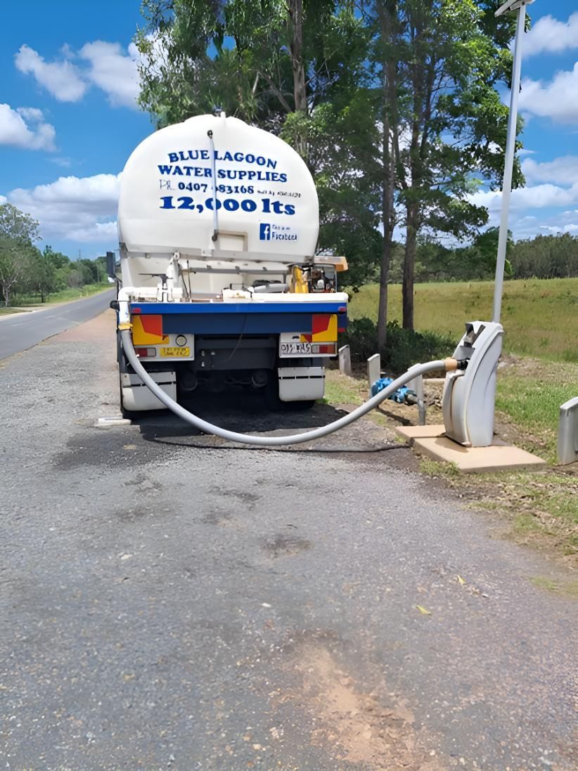 A Water Truck Is Parked On The Side Of The Road — Blue Lagoon Water Supplies In Fraser Coast, QLD