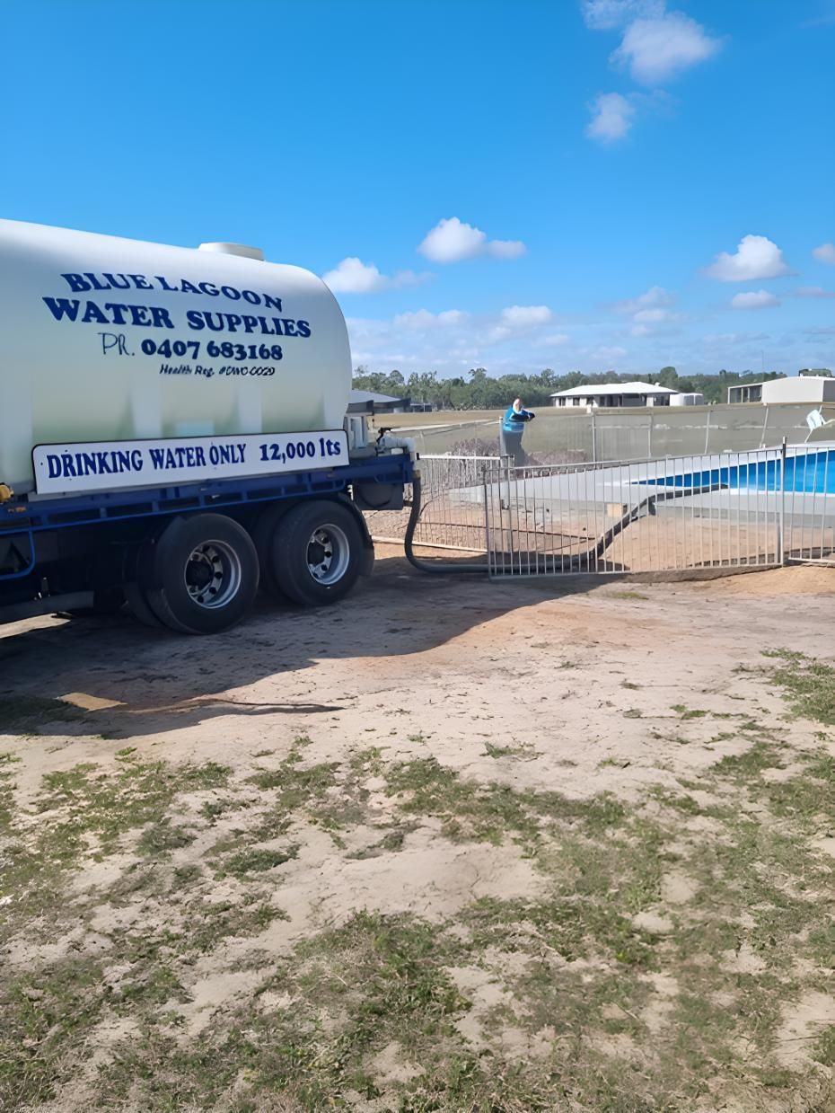 A Water Truck Refilling Swimming Pool — Blue Lagoon Water Supplies In Fraser Coast, QLD