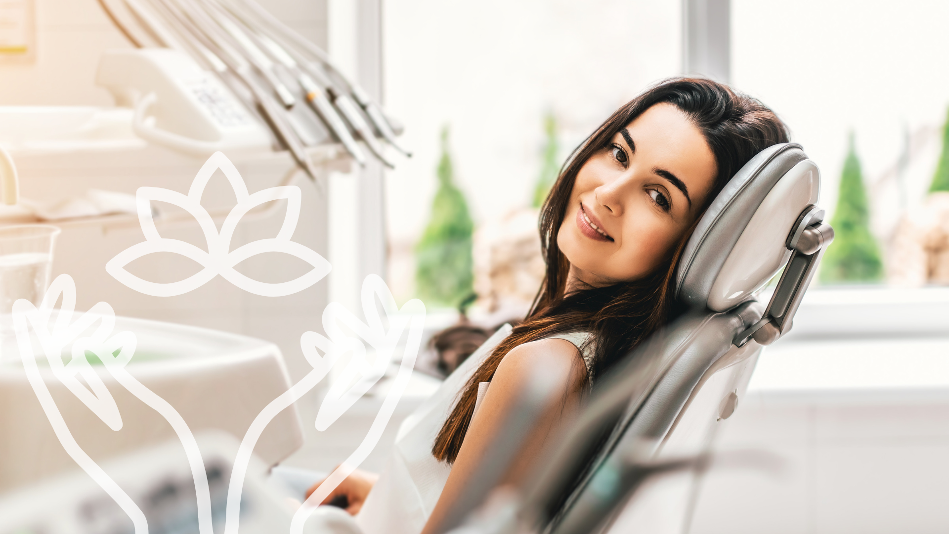 A woman with curly hair is laughing with her mouth open in a park.