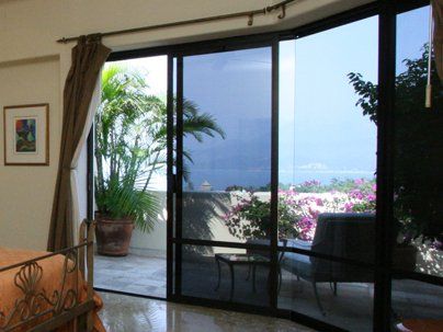 a sliding glass door leading to a balcony