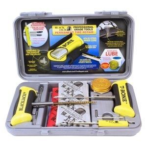A black jack tire repair kit in a case