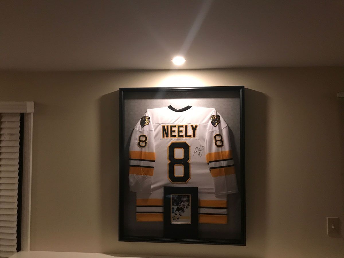 Framed Boston Bruins jersey with the name 