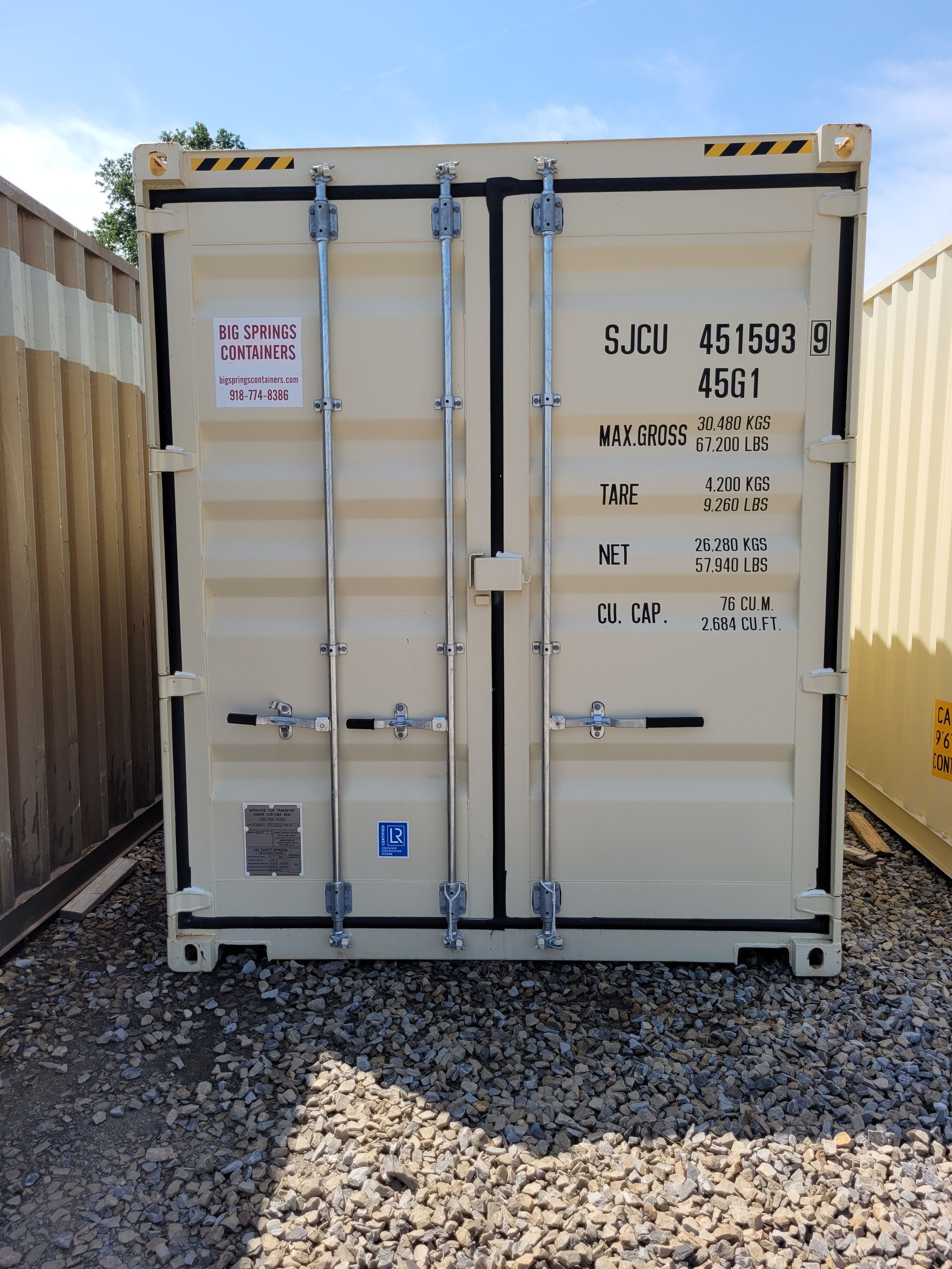 A white shipping container with the number 4651 on it