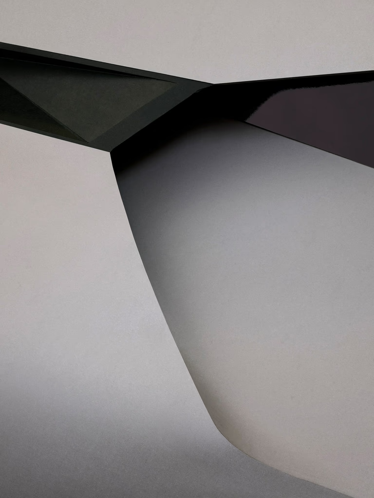 Abstract composition of overlapping geometric shapes in shades of gray, white, and dark green— Tattoo Inc Studio In Broadbeach, QLD