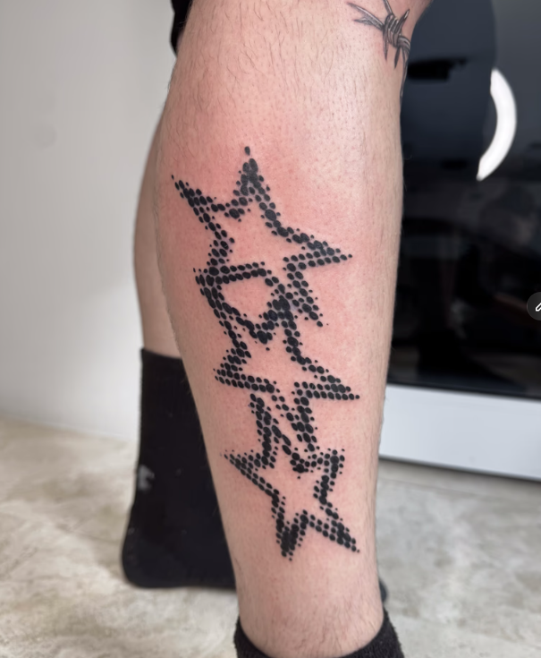 Black Star Tattoo On A Leg, Rendered In Dot Work Style — Tattoo Inc Studio In Broadbeach, QLD