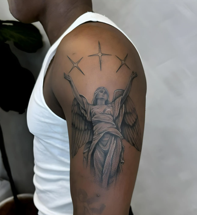 Tattoo Of A Stone Angel With Outstretched Arms, Beneath Three Shining Stars — Tattoo Inc Studio In Broadbeach, QLD