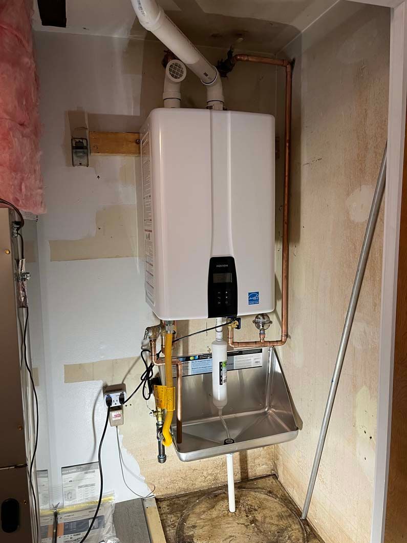 Water meters connected to pipes. Various sizes and colors.