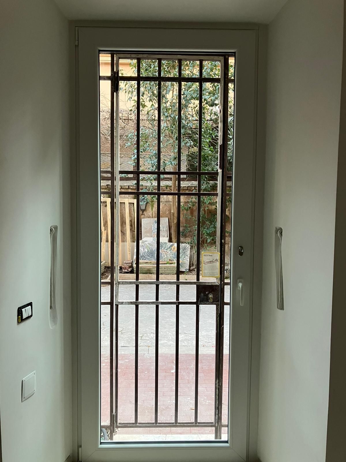 Porte d'ingresso con cancellata Comerci Serramenti Roma