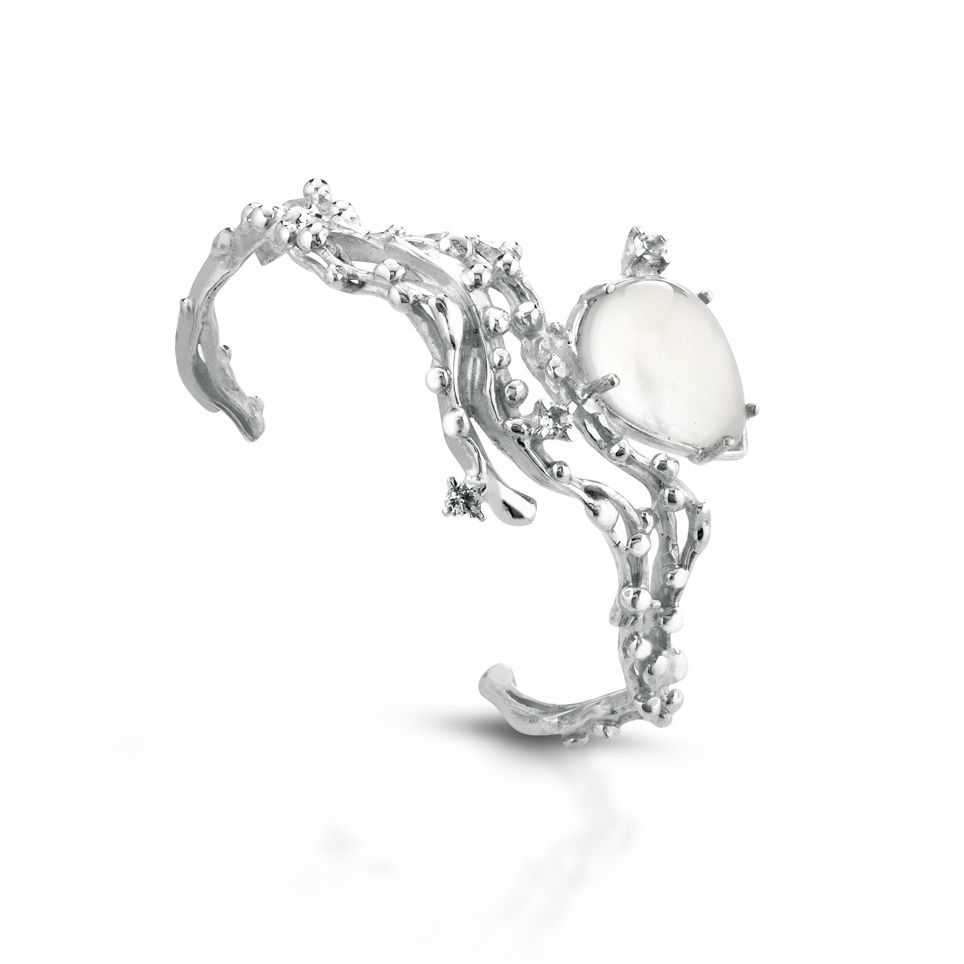 Silver, white topaz, and double mother-of-pearl and rock crystal bracelet