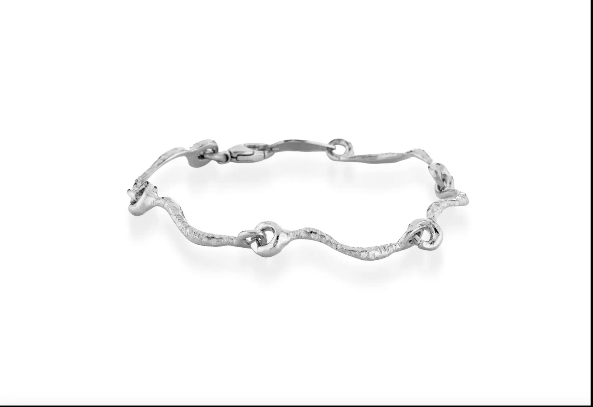 Bracciale in bronzo, argento e topazio bianco