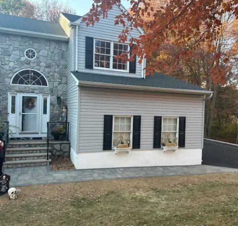 Black Diamond Paving & Construction LLC team showcasing quality workmanship and customer satisfaction