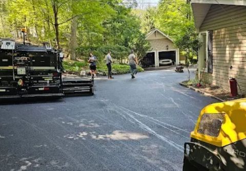 High-quality asphalt paving solutions being applied to create durable and smooth pavement