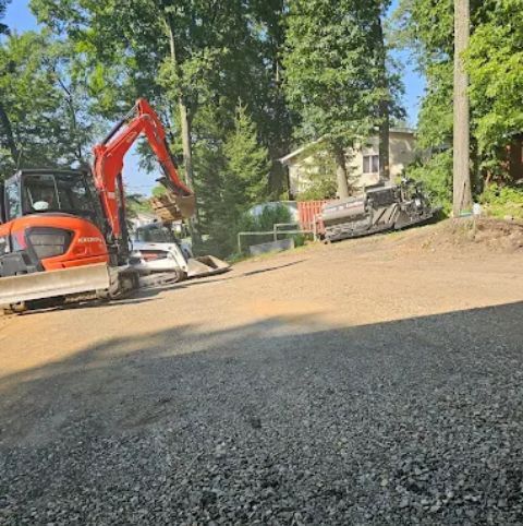 Professional land clearing and excavation services using bulldozers and excavators on-site