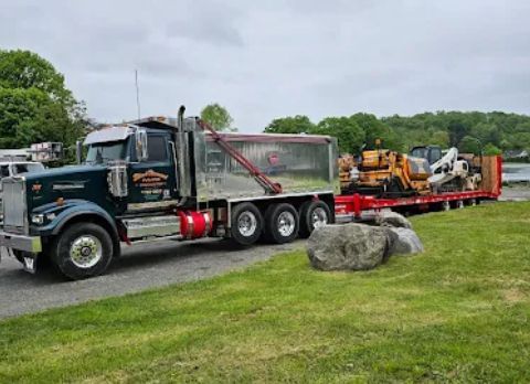 Top-rated paving contractors working on a residential driveway in Morris County, NJ