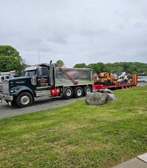 Team of professional paving contractors standing together, representing the company’s values and experience