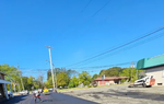Freshly paved commercial parking lot with clear line markings and smooth asphalt surface