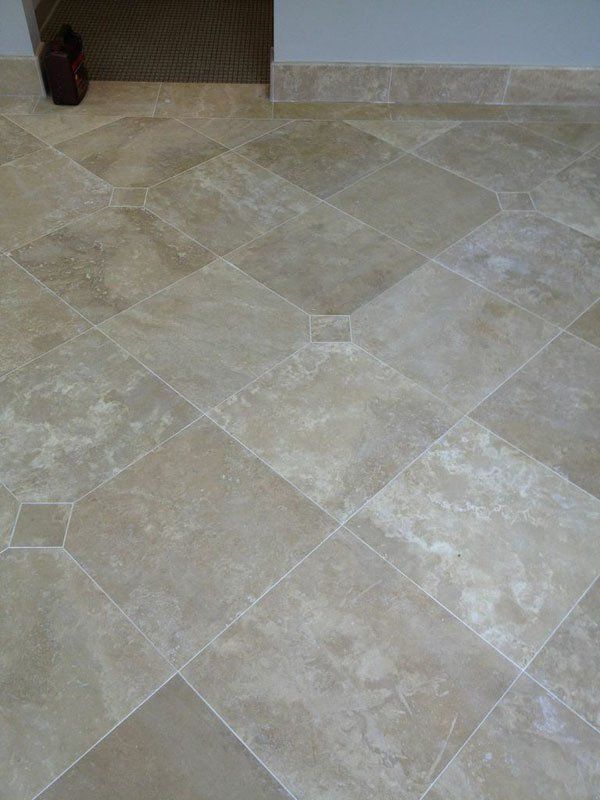 Stone Flooring — Stained Gray Tile Flooring in North Charleston, SC