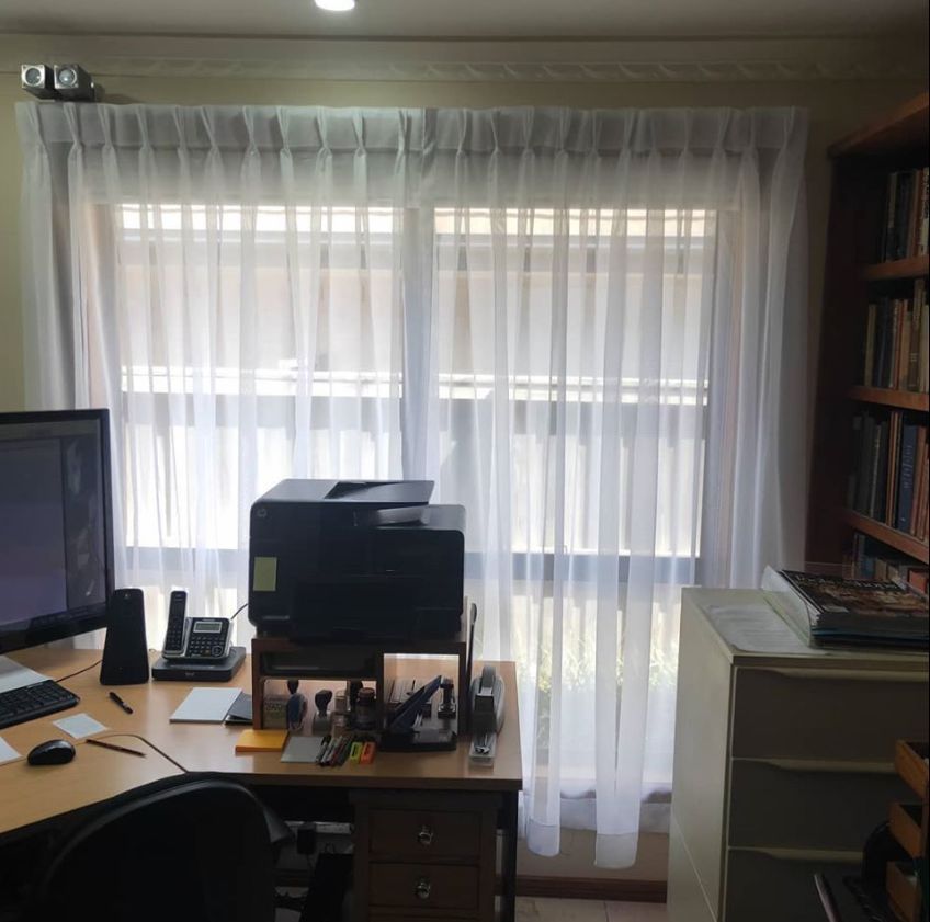 Room with office supply and books - Curtains in Welby, NSW