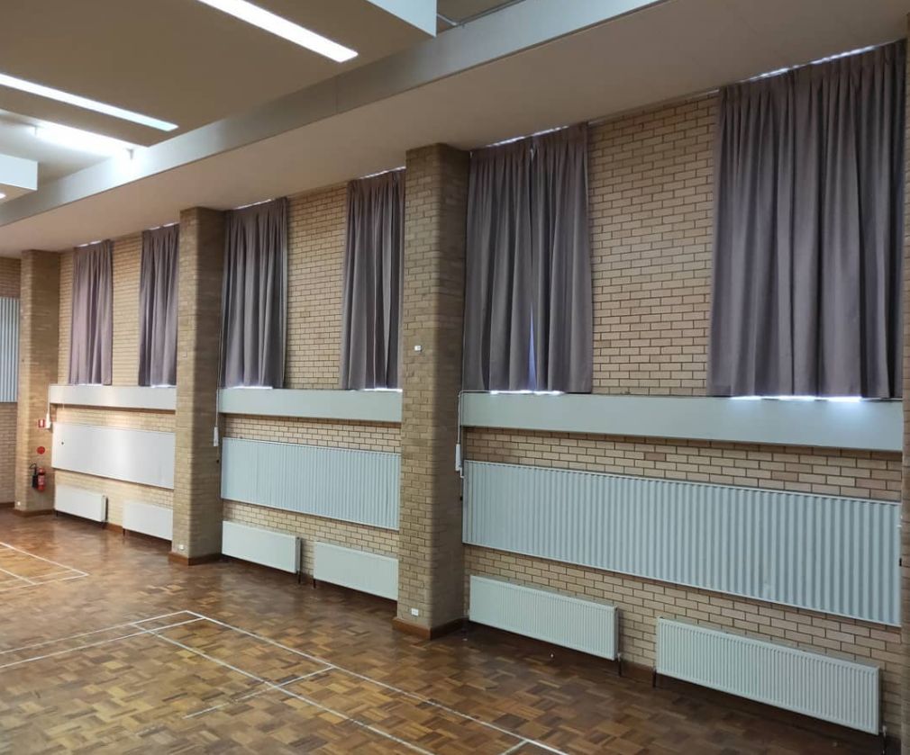 Brick wall with curtains - Curtain in Welby, NSW