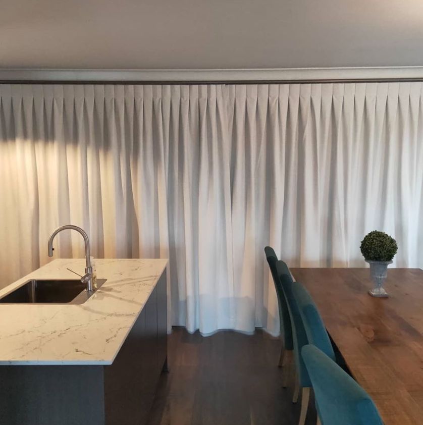 Installed sink, table and chairs - Curtains in Welby, NSW