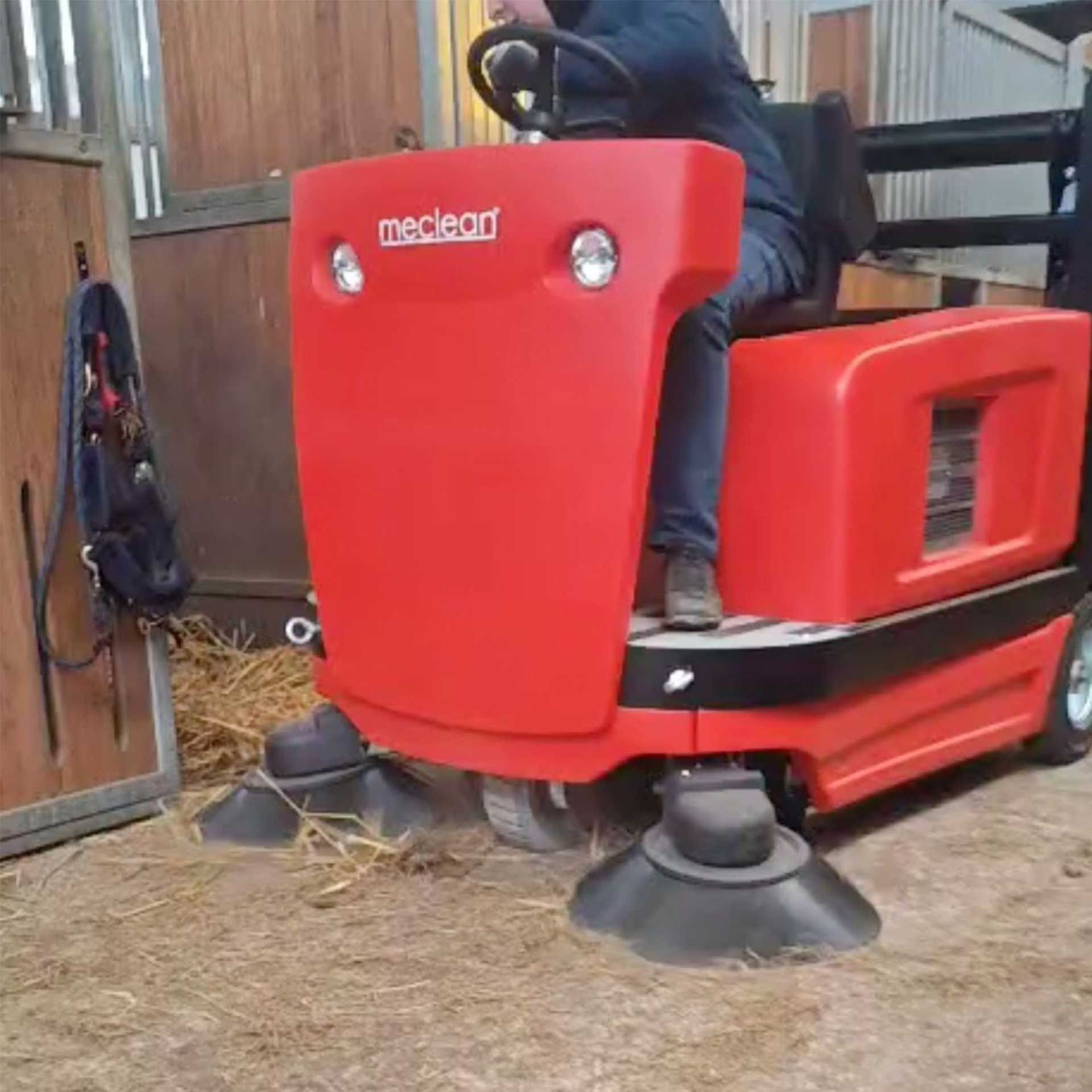 Meclean industrial sweeper diesel powered drive BUSTER 1300TTD sweeping straw in horse stable corridors
