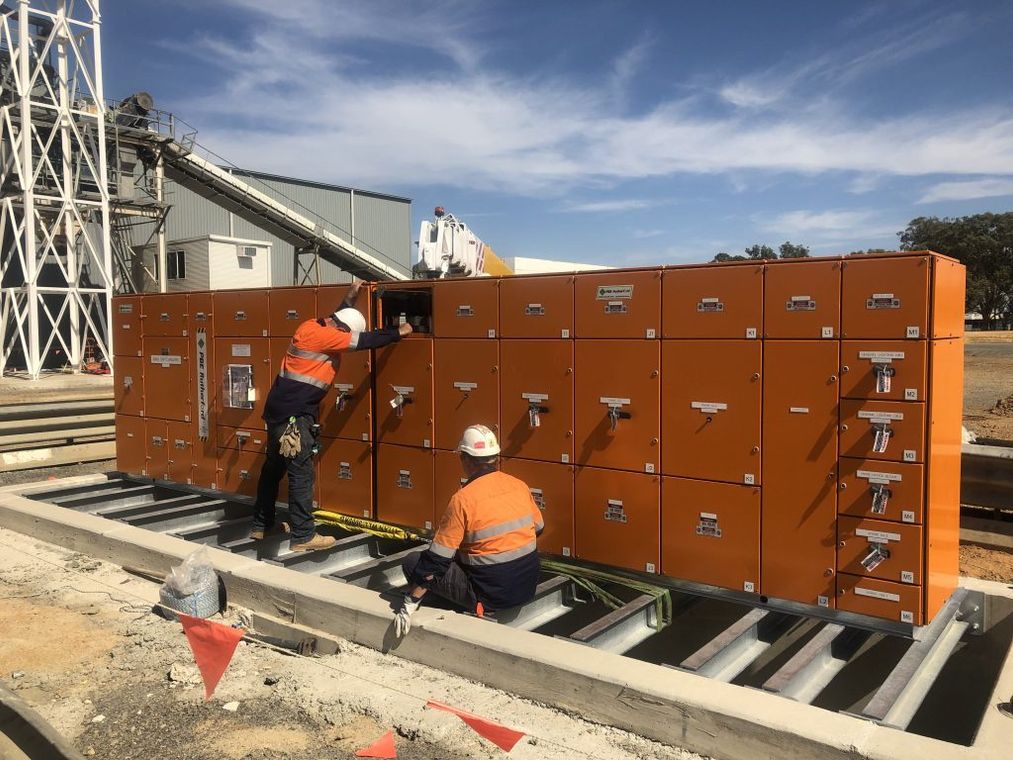 Experts Checking Switchboard Panels — Switchboard Manufacturers in Dubbo, NSW