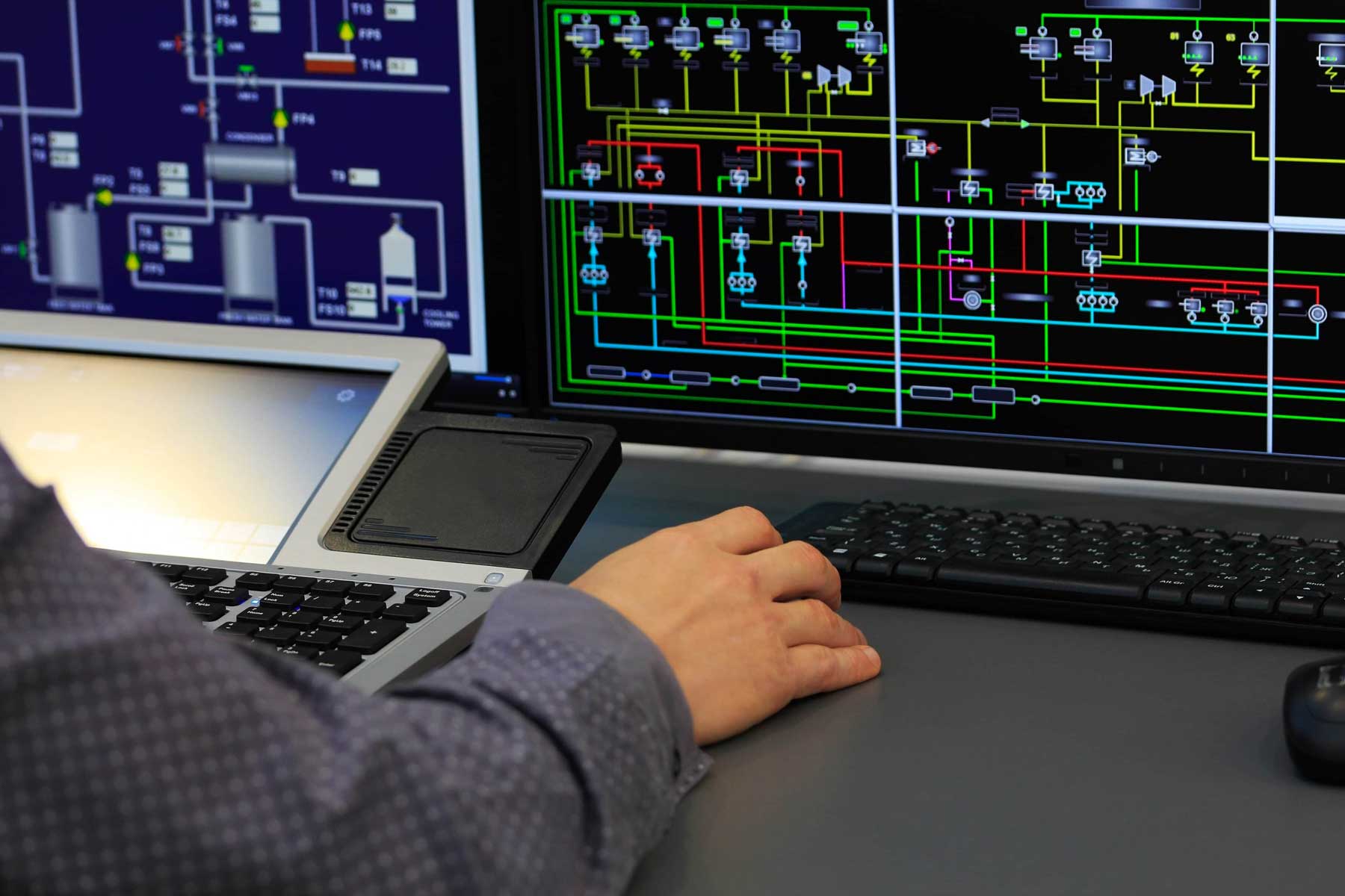Man Working On Computer — Industrial Automation in Dubbo, NSW