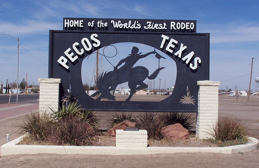 A sign that says pecos texas on it