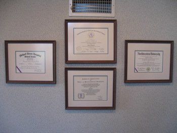 Framed Board Certification certificates on a wall
