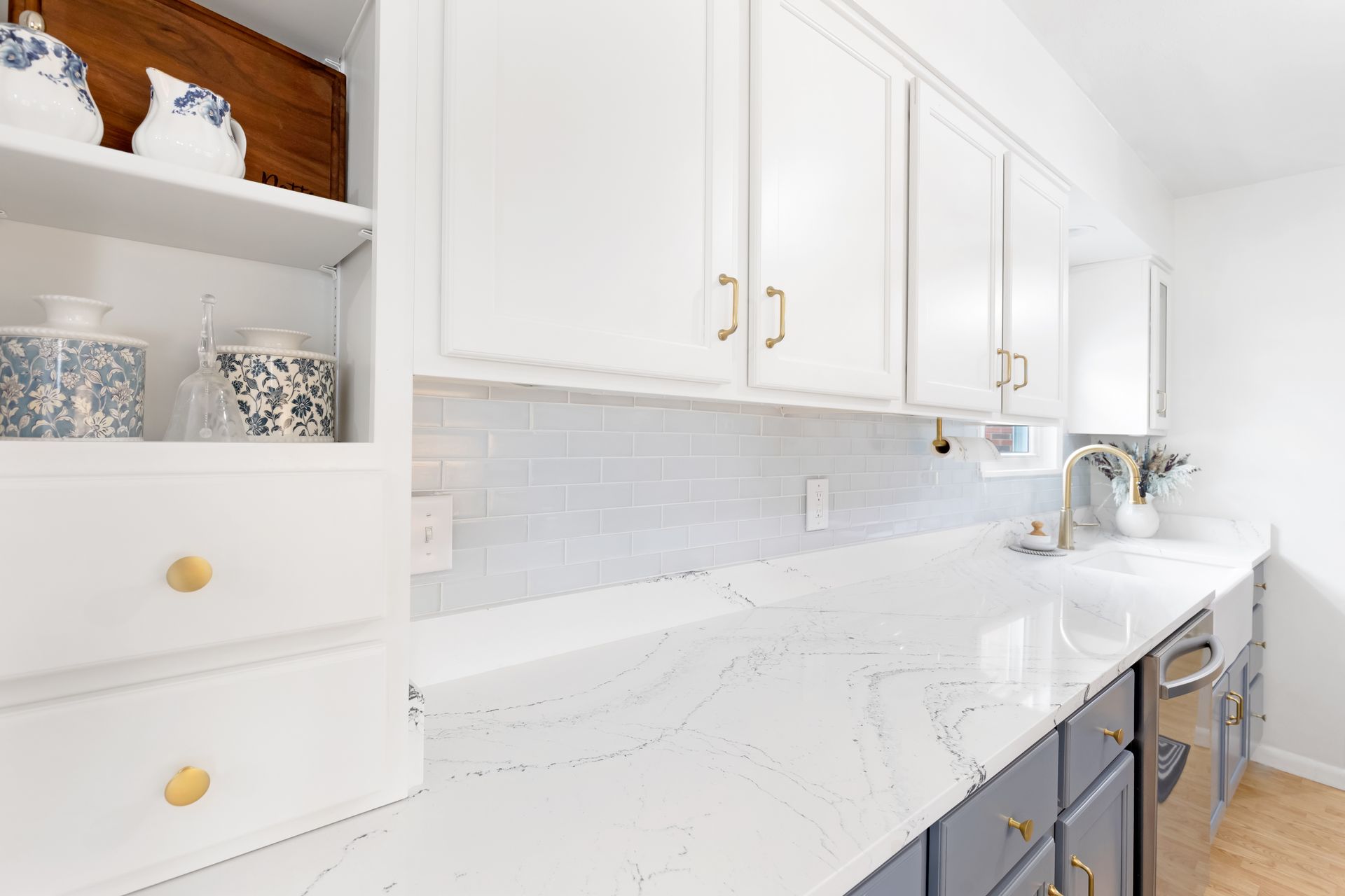 Custom Built Cabinets, Upper - Swiss Coffee, Lower - Storm Cloud, Cambria Potrush Countertops by Counter Culture