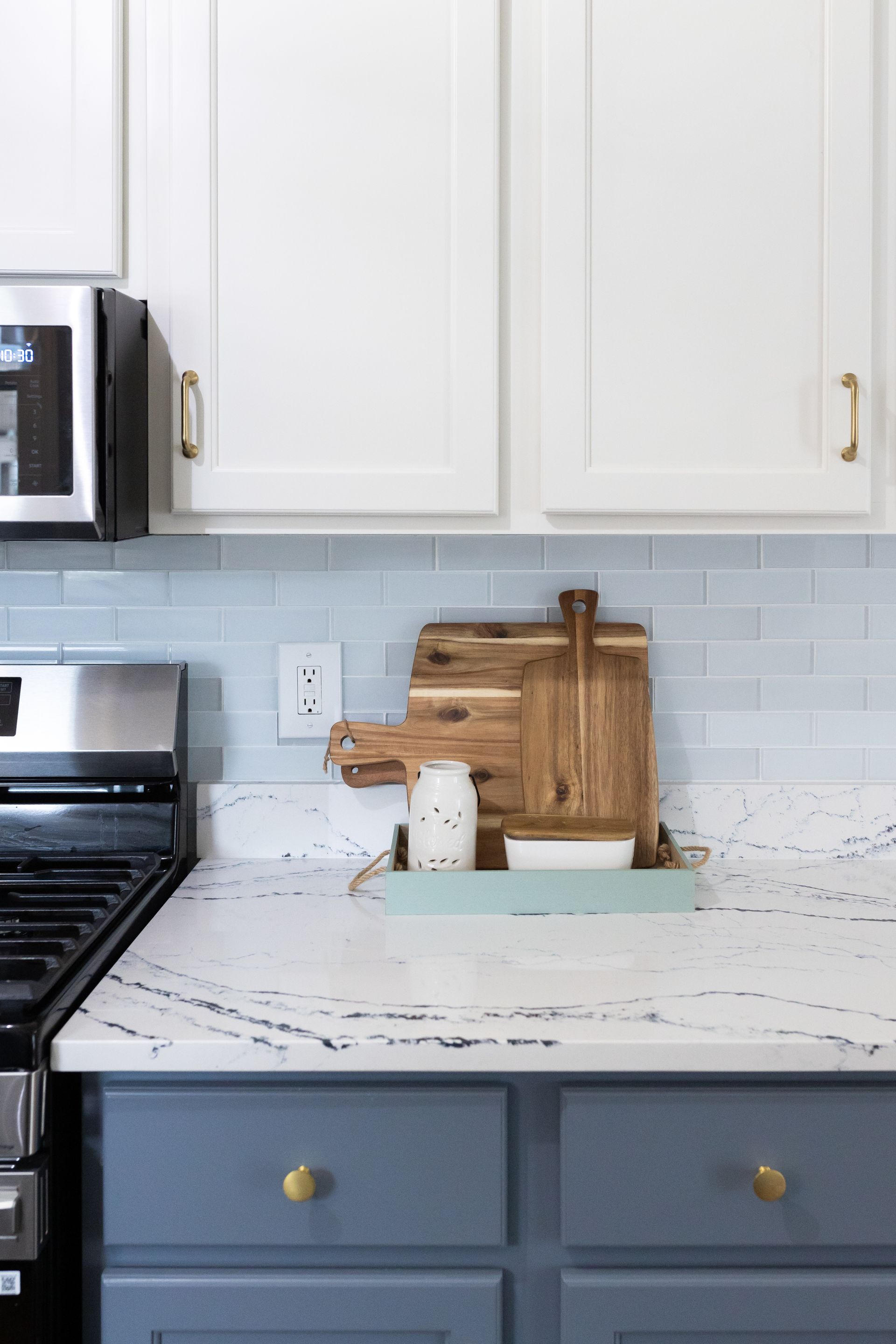 Custom Built Cabinets, Upper - Swiss Coffee, Lower - Storm Cloud, Cambria Potrush Countertops by Counter Culture